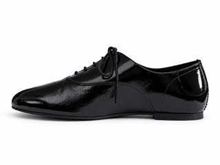 Side profile of a black soft crinkled patent Maévie Oxford Ballet flat, showing the flat sole and low heel